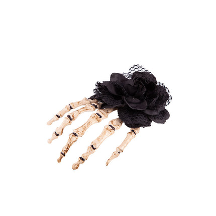 Hand skelet haarclip met zwarte roos