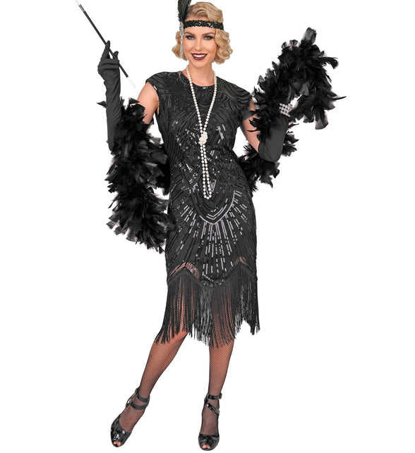 Gatsby flapper jurk zwart met punt-tot-punt franjezoom, gedragen op een jaren 20-themafeest