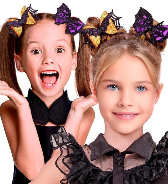 Meisjes met haarclips vleermuis en spinnenweb in staarten en knotjes bij Halloweenoutfit