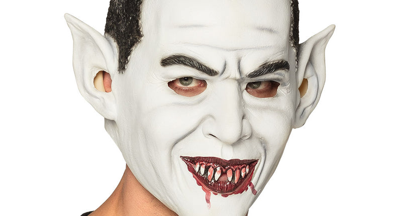 Latex hoofdmasker vampier in wit met zwarte puntige haarlijn en bloedrode tanden voor Halloween