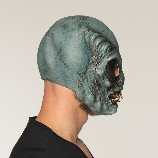 Alien hoofdmasker van latex zijaanzicht met kale gerimpelde schedel en puntige tanden