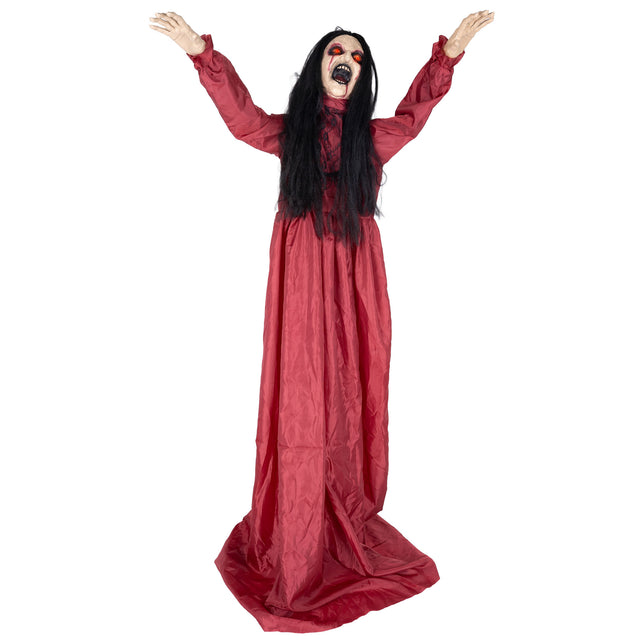 Animatronic meisje met gebroken rug 157 cm in rode jurk met zwart haar en opgeheven armen voor Halloween