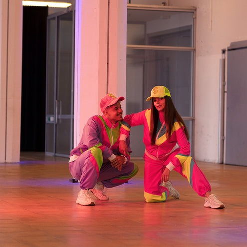 Boland Trainingspak Retro babe neon roze