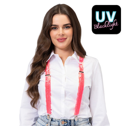 Bretels met pailletten neonroze en metalen clips, gedragen over een wit overhemd voor een neon party