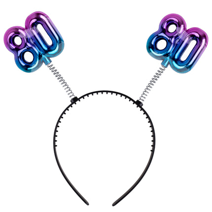 Diadeem 80 jaar regenboog met metallic paars-blauwe cijfers 80 op spiraaltjes en zwarte metalen haarband