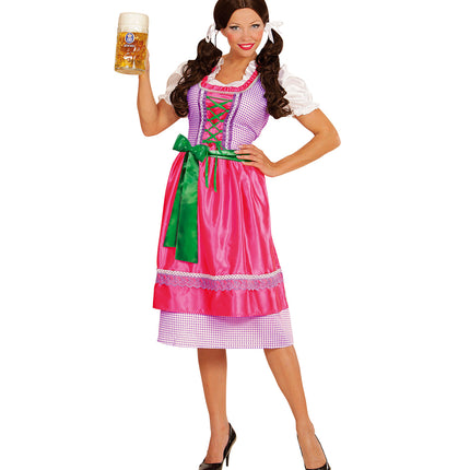 Dirndl jurk roze groen op dames met groene strikschort en bierpul tijdens Oktoberfest