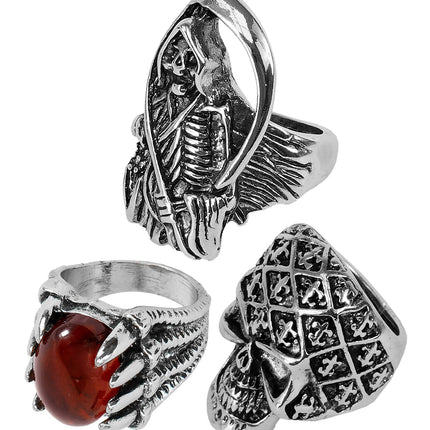 Drie zilverkleurige halloweenringen: dood met zeis, klauw met rode steen en geruite schedelring