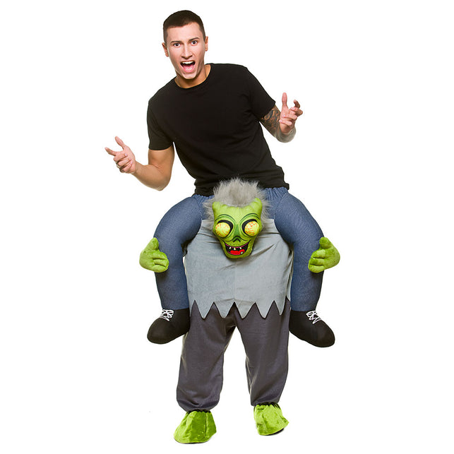 Gedragen door zombie instapkostuum met groene zombiekop, grijze bovenkant en nepbenen voor Halloween