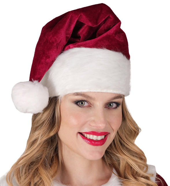 Kerstmuts Santa December op het hoofd van een dame, witte rand tot boven de wenkbrauwen