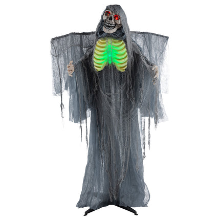 Levensgrote Crypt keeper met gloeiende rode ogen en groene ribbenkast als staande griezelfiguur voor Halloween