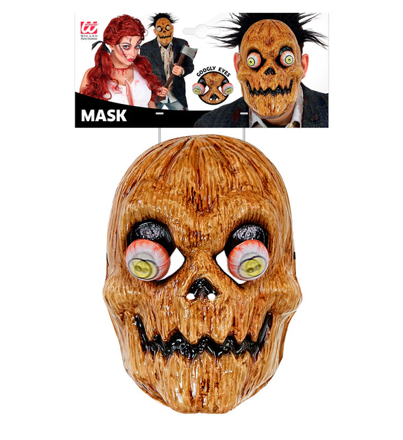 Pompoenmasker Timo op verpakkingskaart, met detail van de wiebelende oogbollen