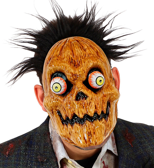 Pompoenmasker met wiebelende ogen gedragen door heer, eigen haar blijft zichtbaar