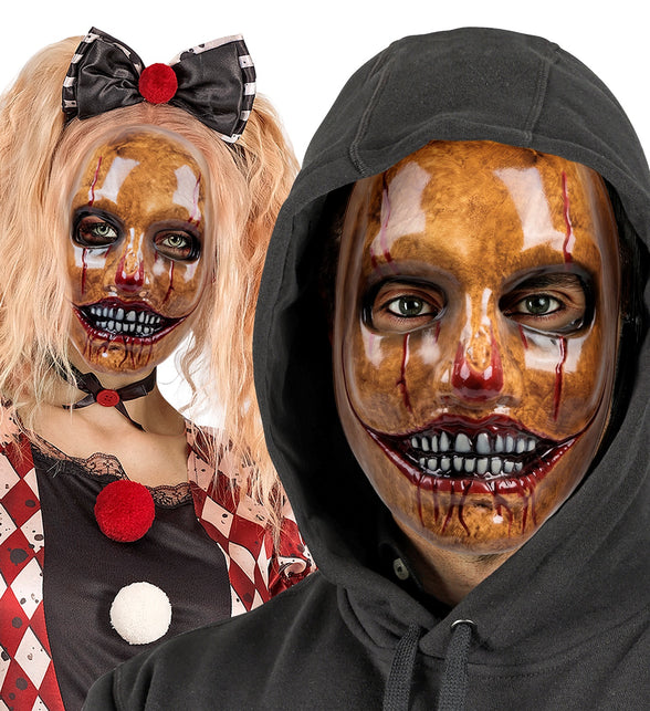 Psycho clown masker gedragen door twee personen op een Halloweenfeest