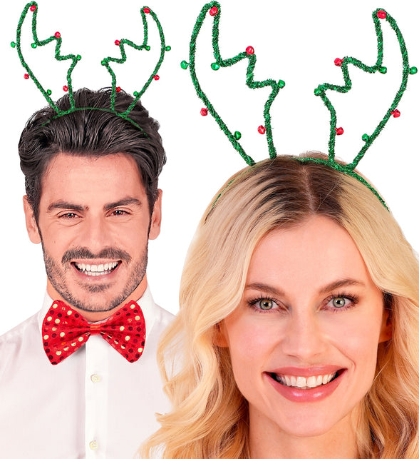 Rendier hoofdband groen gedragen door man en vrouw tijdens een kerstborrel