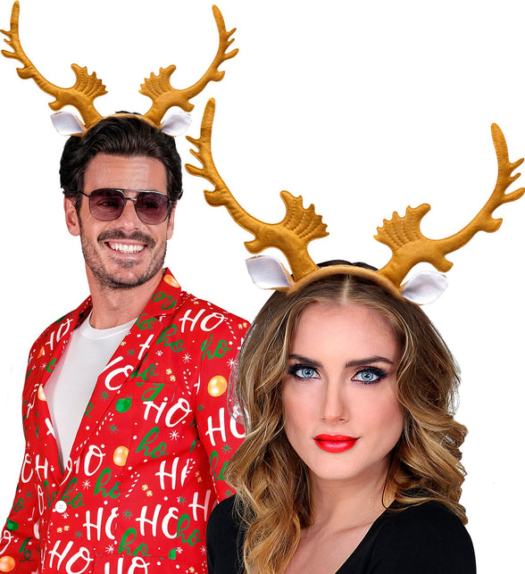 Rendierhorens gedragen door man en vrouw bij een rode kersttrui tijdens Kerst