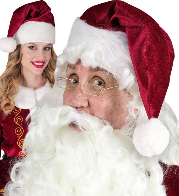 Rode kerstmuts met witte rand gedragen bij een witte baard en pruik tijdens Kerst