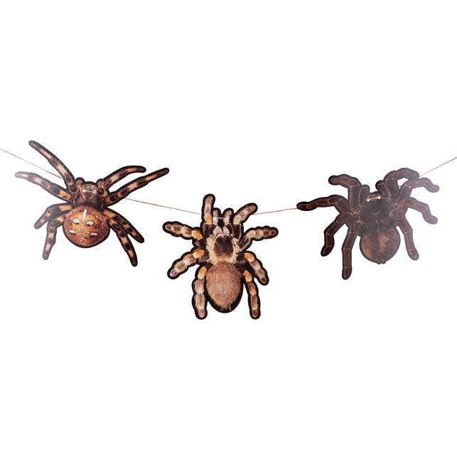 Slinger spin met drie bruin-zwarte papieren spinnen aan een koord voor Halloween