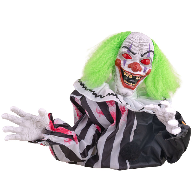 Tafelclown animatronic 35 cm met groen haar en zwart-wit gestreepte outfit voor Halloween