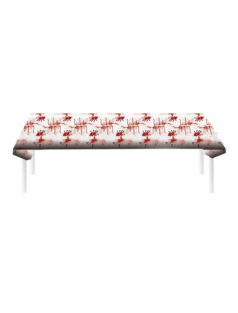 Tafelkleed met print bloederige handen in wit met rode handafdrukken, over een tafel gelegd voor Halloween