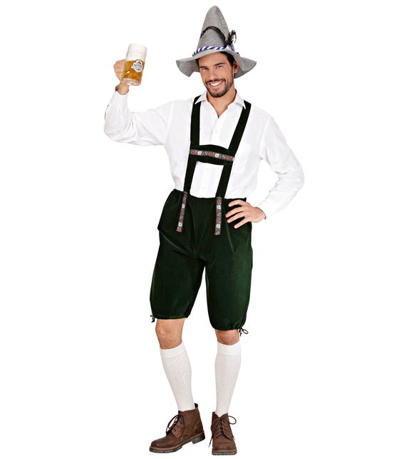 Tiroler broek lederhose groen met bretels en bloemenband, gedragen op Oktoberfest