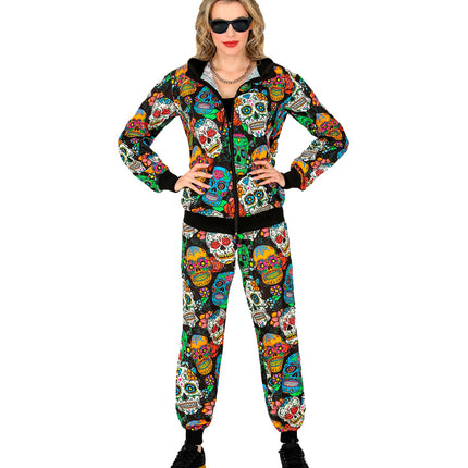 Trainingspak dia de muertos dames, broek met zwarte boorden en schedels in groen, blauw en oranje