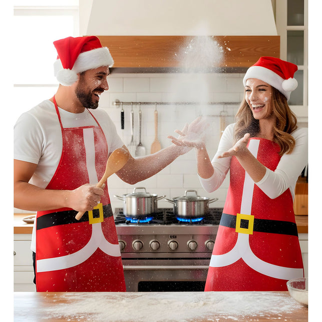 Twee kerstschorten met kerstmanopdruk in de keuken tijdens het bakken voor het kerstdiner