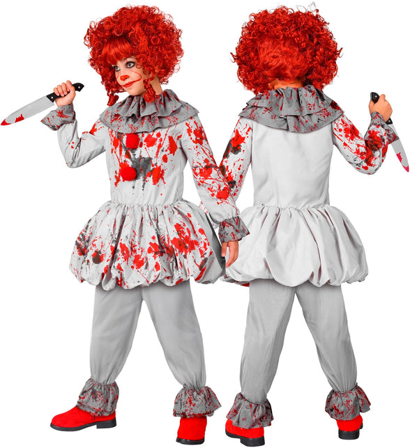 Vintage killer clown kostuum kind gedragen met rode pruik en clownsschmink