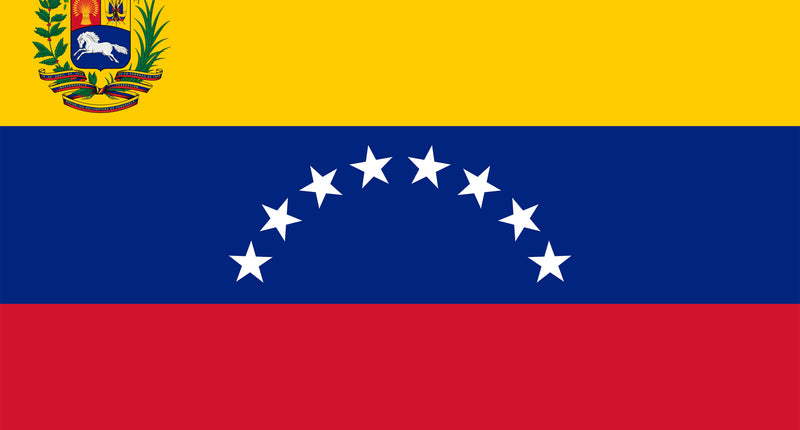 Vlag Venezuela in geel, blauw en rood met acht witte sterren in een boog en het landswapen linksboven