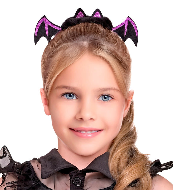 Vleermuis scrunchie rond hoge knot, vleugels en roze glitteroortjes vooraan zichtbaar