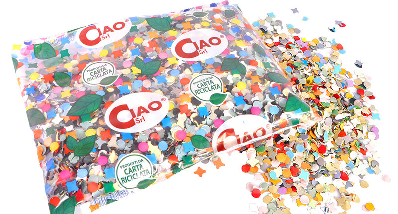 Zak confetti Party multikleur met ronde stippen en sterretjes van papier, deels uit de doorzichtige zak gestrooid