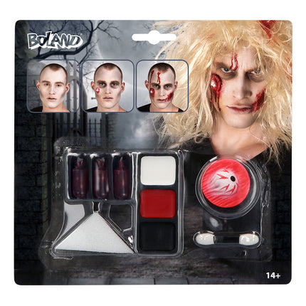 Zombie schminkset van Boland op kaart: drie nepbloedcapsules, latex wond, vetschmink zwart rood wit, spons en applicator