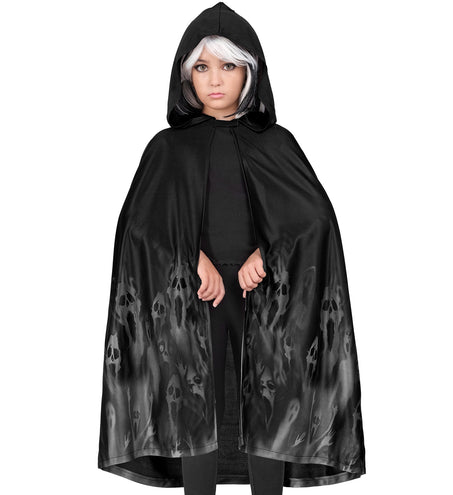 Zwarte cape met capuchon en grijze spookgezichten, gedragen over zwart shirt en legging
