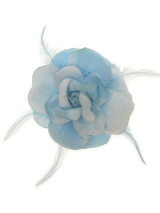 Blauwe bloem decoratie op speld