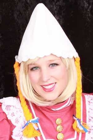 PartyXplosion Boerinnenkap met oranje vlechten en strikjes