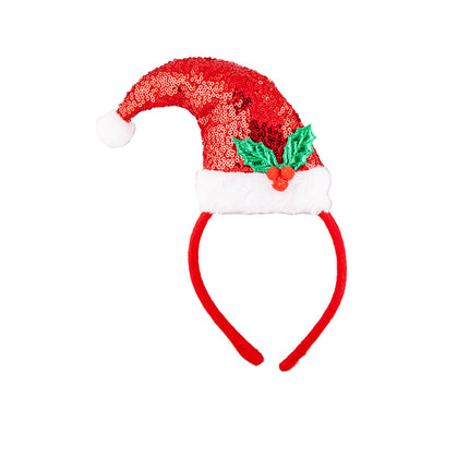 Tiara met mini kerstmuts Santa: rood paillettenmutsje met witte rand, pompon en groene hulst op een haarband